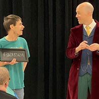 An employee is making the magic happen at a workplace show in Minnetonka, MN.