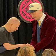 An employee is making the magic happen at a workplace show in Minnetonka, MN.